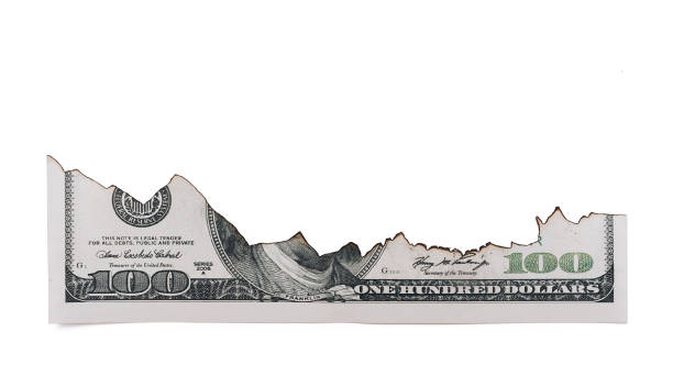 istock Burnt 100 dollar bill on white background. Copy space, isolated. 1185297378