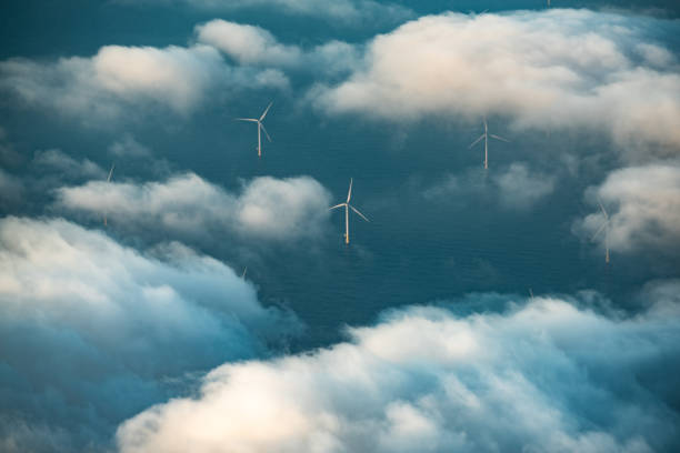 istock Wind turbines at sea 1185297928