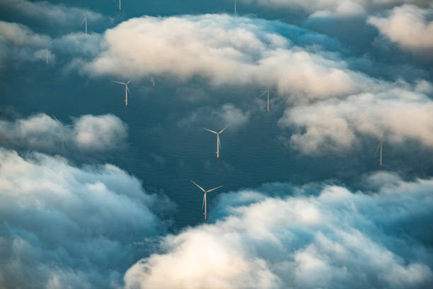 istock Wind turbines at sea 1185298630