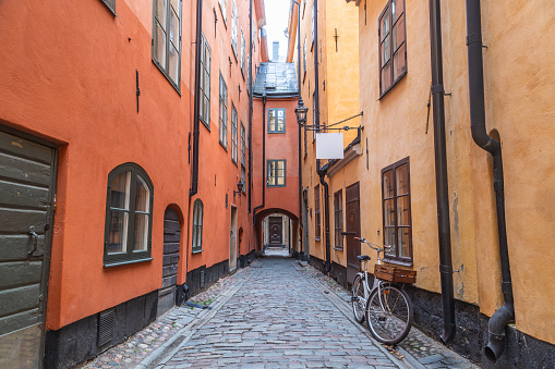 Colorful streets in the Gamla Stan (Old Town) of Stockholm. Showing a beautiful arched facades and architecture.