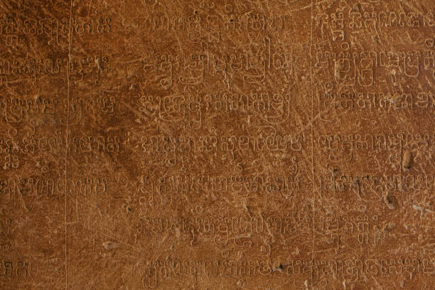istock Ancient cave inscriptions of Khmer civilization in Angkor Wat Temple 1185300664