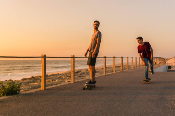 istock Skaters training near the sea 1185304104