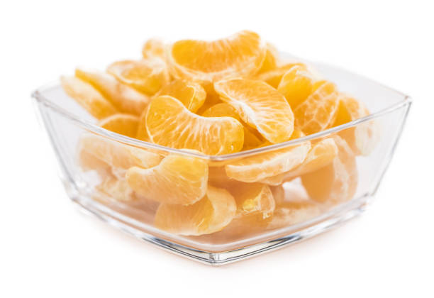 istock Portion of tangerines (close-up shot) isolated on white 1185304254