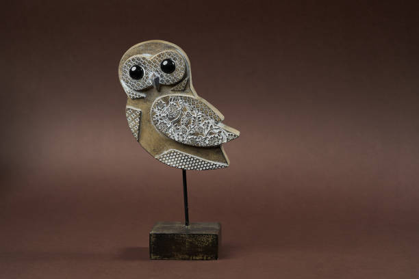 istock Wood owl toy over grey background with copy space 1185307120