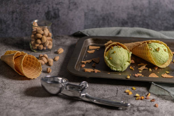 istock Pistachio ice cream in waffle cones 1185307293
