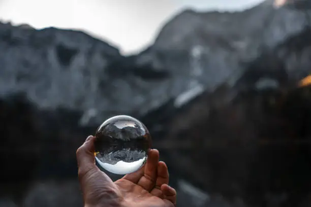 glas ball flying in front of an beautiful lake in ebensee Austria