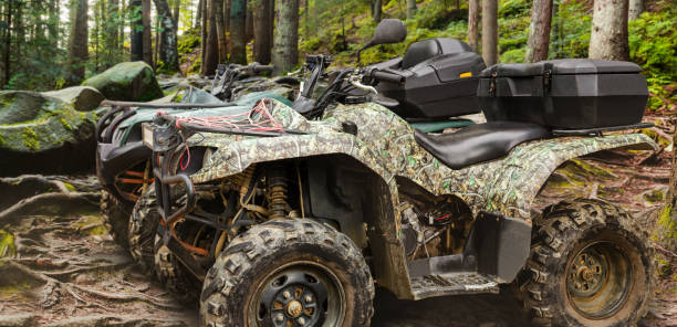 istock Camouflaged hunting offroad atv. 1185309826