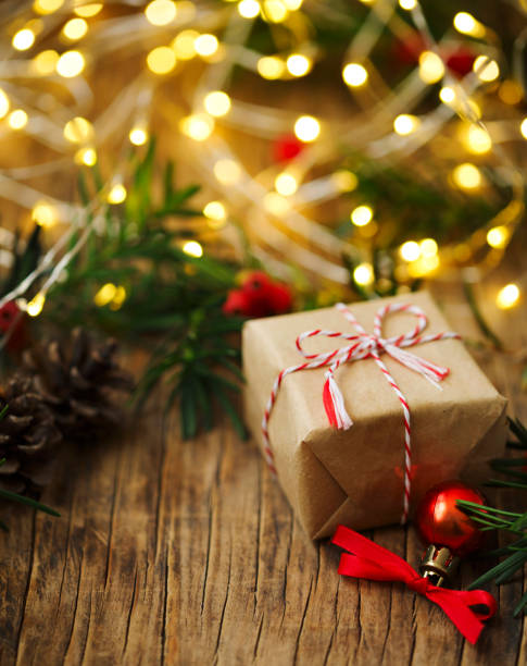 istock Christmas gift box and lights 1185312440
