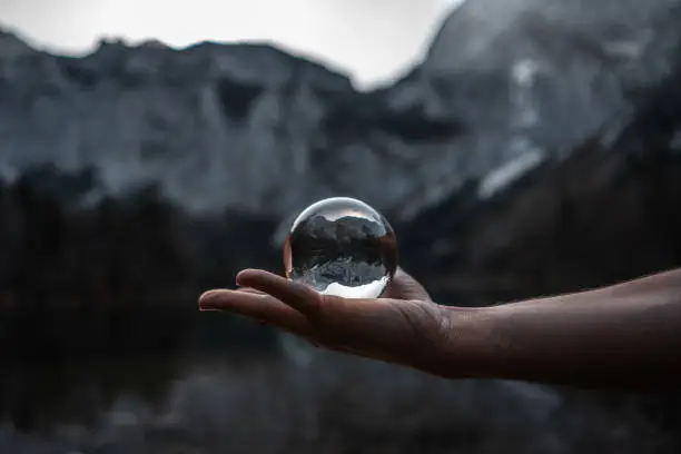 glas ball flying in front of an beautiful lake in ebensee Austria