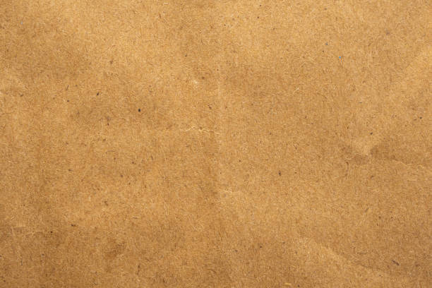 istock Old brown eco recycled kraft paper texture cardboard background 1185316678