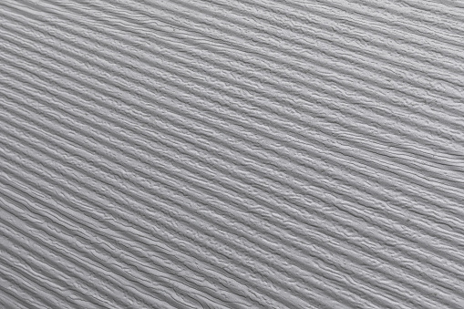 Diagonal stripes on wall background with stripes