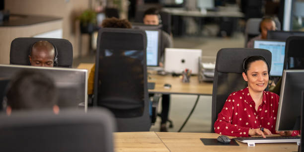 istock People working in a call centre office 1185316840