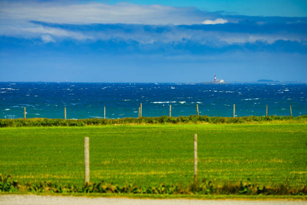 Coastal landscape with lighthouse in south Norway, Norwegian national tourist county route road 44 Jaeren.