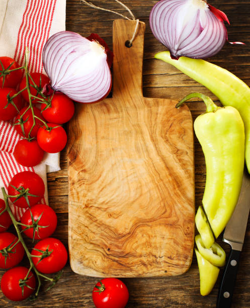 istock Raw organic vegetables for cooking on rustic wooden background 1185319005
