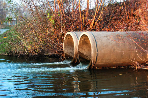 istock Discharge of sewage into a river 1185321093