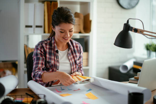 istock Smiling designer in her studio. stock photo 1185321449