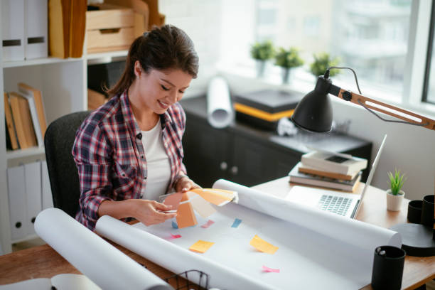 istock Smiling designer in her studio. stock photo 1185322517