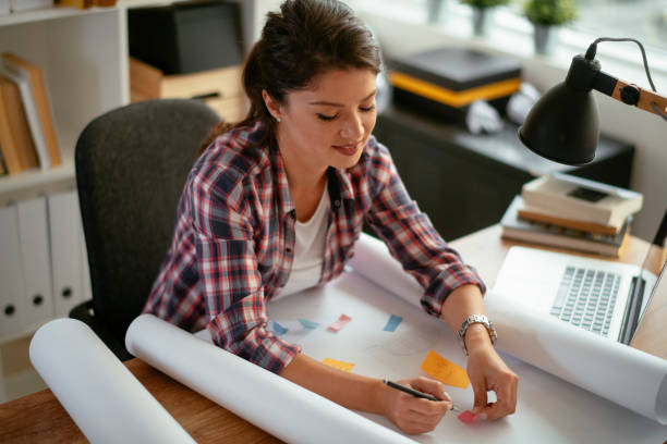 istock Smiling designer in her studio. stock photo 1185322553