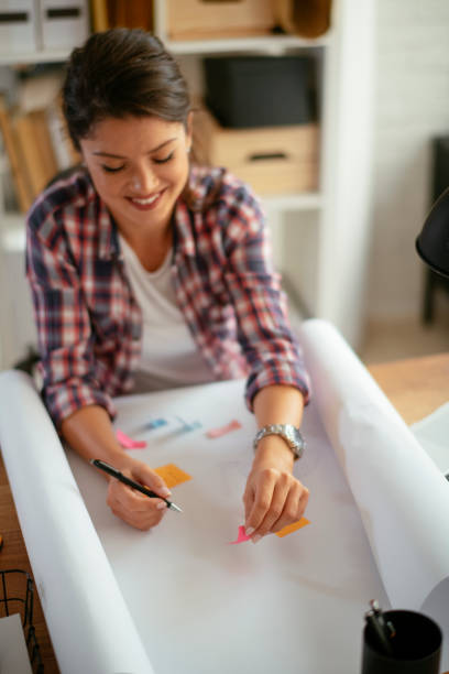istock Smiling designer in her studio. stock photo 1185323346