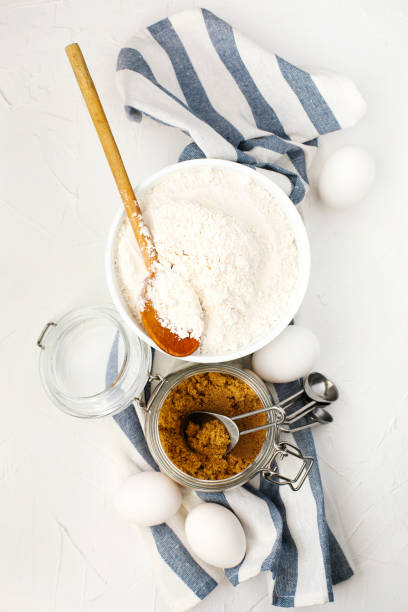 istock Flour, brown sugar and eggs for baking 1185324208