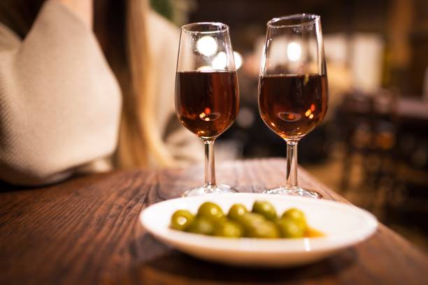 vermouth and olives at a rustic bar stock photo