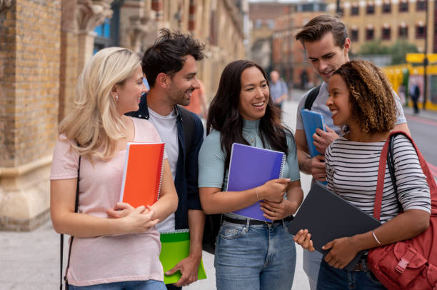 istock Happy group of students studying abroad in London 1185326218