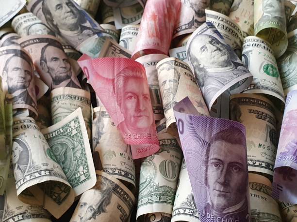 istock chilean banknotes and american dollar money 1185328682