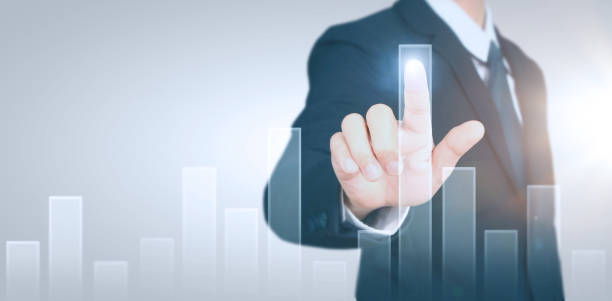 istock Businessman plan graph growth and increase of chart positive indicators 1185328971