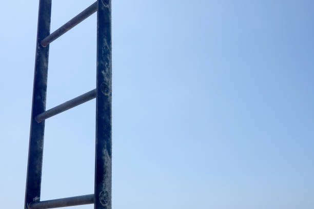 Old Ladder against Blue Sky