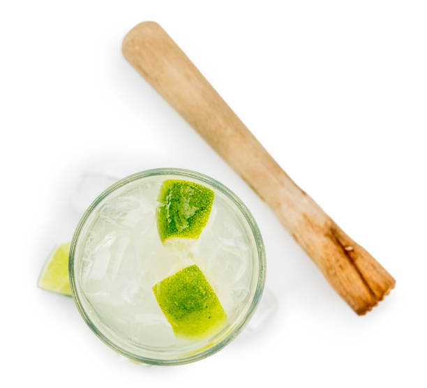 istock Caipirinha isolated on white background (selective focus; close-up shot) 1185329938
