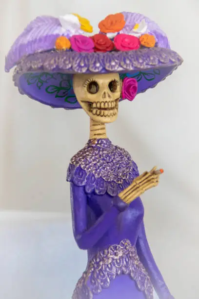 The Catrina dolls are an important part of the Day of the Dead celebration in Mexican culture. Photographed from vendors at the Day of the Dead (Dia los Muertos) celebration in Patzcuaro’s grand plaza in the state of Michoacan, Mexico.