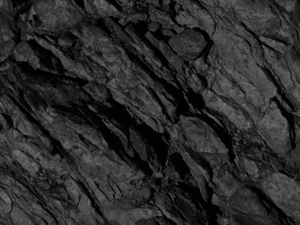 istock Black rock background. Dark gray stone grunge background. Rock texture. 1185335642