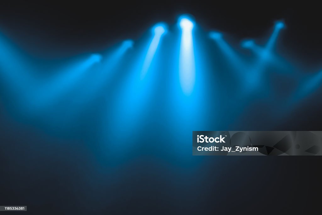 Blue Light show on the stage. lighting devises. Backgrounds Stock Photo