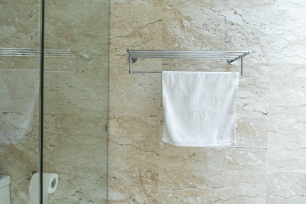 istock Clean towels on rack in the bathroom. 1185336521