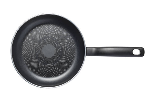 istock Black skillet with non-stick coated surface isolated 1185343036