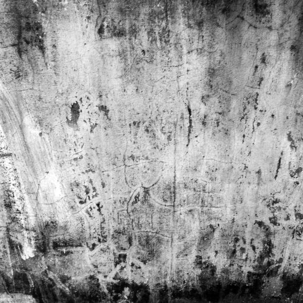 istock Texture of old dirty gray cement and concrete for background and pattern with copy space. Grunge outdoor. Dark vintage grey brick wall wallpaper design. 1185344872
