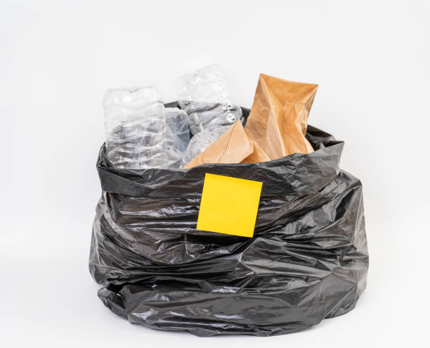 istock Trash bag with recycle garbage on white background 1185350716