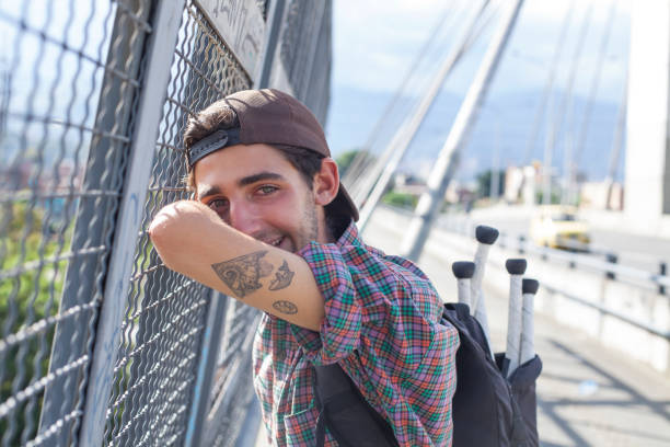 istock Traveler man looking at the landscape from a bridge 1185350718