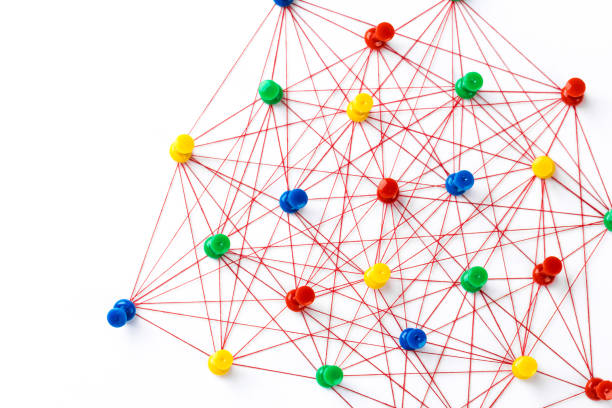 istock Network connection made from push pins and thread on blue background, close-up. 1185353188