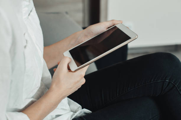 istock A picture of a young woman working on a tablet computer 1185353287