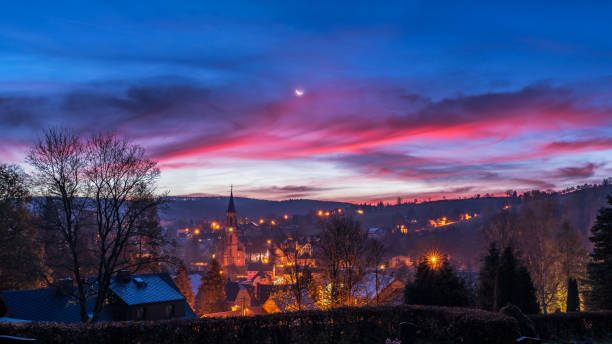 sunrise at neuhausen saxony near spa town seiffen. panorama view - scenics building exterior tourist resort orange stock-fotos und bilder