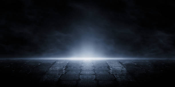 istock 3D rendering old wet asphalt, reflection of neon lights, a searchlight, smoke. Abstract light in a dark empty street with smoke, smog. Dark background scene of empty street, night view, night city. 1185354330