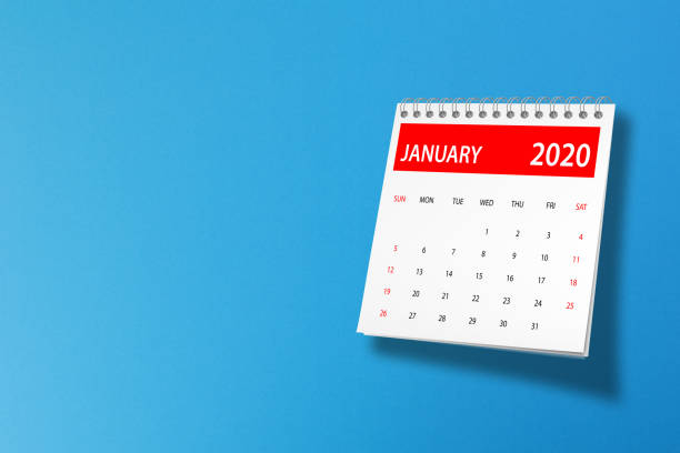 istock January 2020 calendar on blue background 1185356157