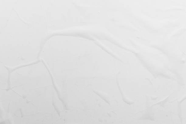 istock A white sheet of paper with slight bends. 1185360048