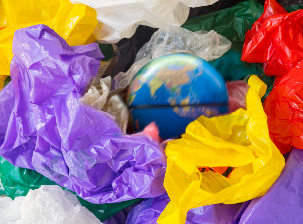 istock Earth and Plastic bags, environmental hazard 1185361386