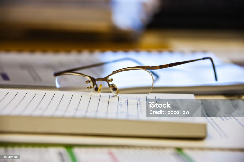 Design elements generic business background Design elements generic business background with glasses and with papers Calendar Stock Photo
