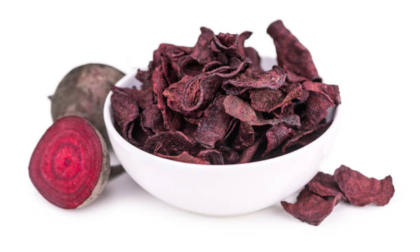 istock Beetroot Chips as detailed close-up shot isolated on white background (selective focus) 1185365662