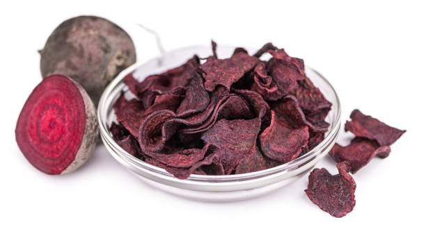 istock Beetroot Chips as detailed close-up shot isolated on white background (selective focus) 1185365696