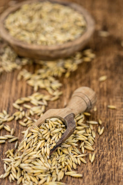 istock Vintage wooden table with Oat (selective focus; close-up shot) 1185367897