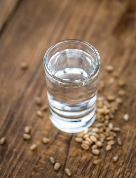 istock Some fresh Wheat Liqueur on wooden background (selective focus; close-up shot) 1185370172